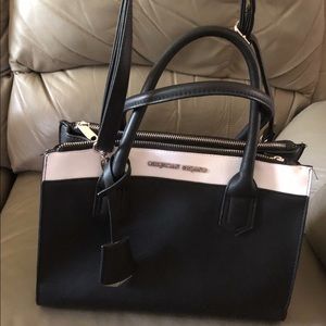 Black and white Christian Siriano purse.